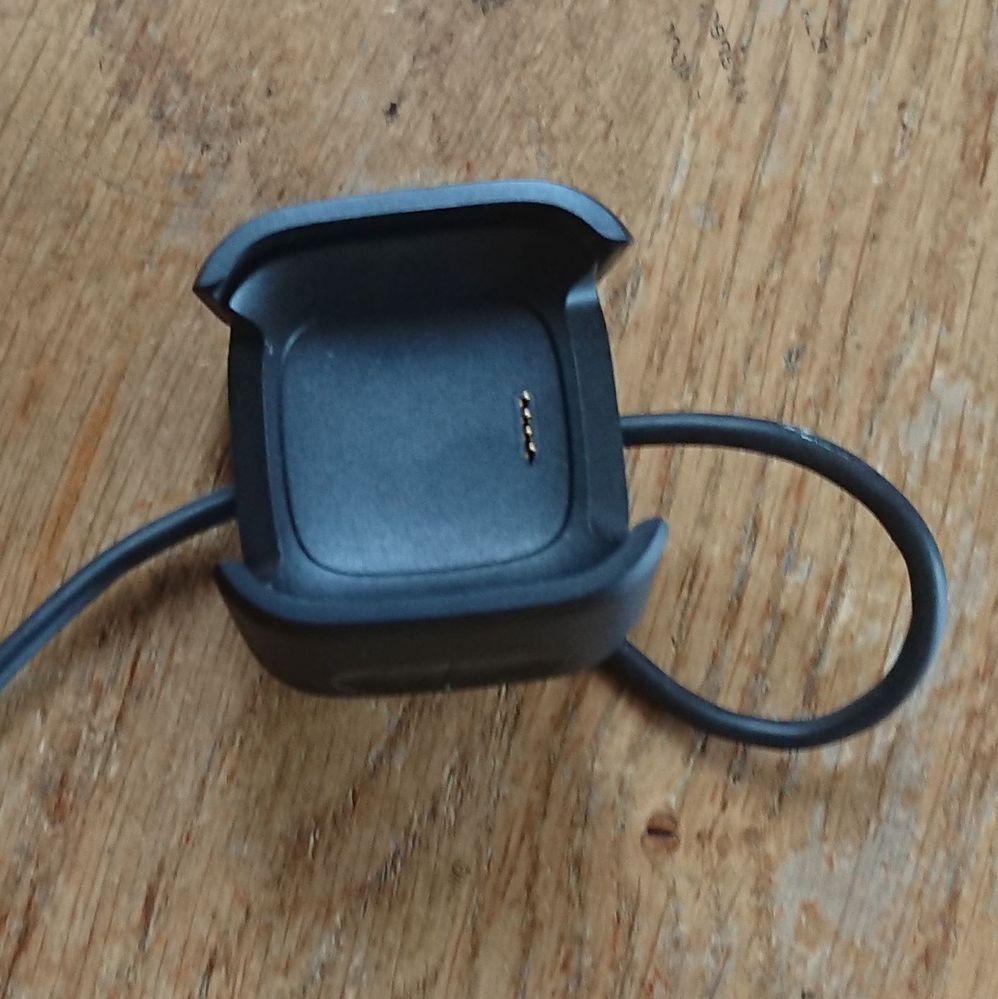 versa 2 charger