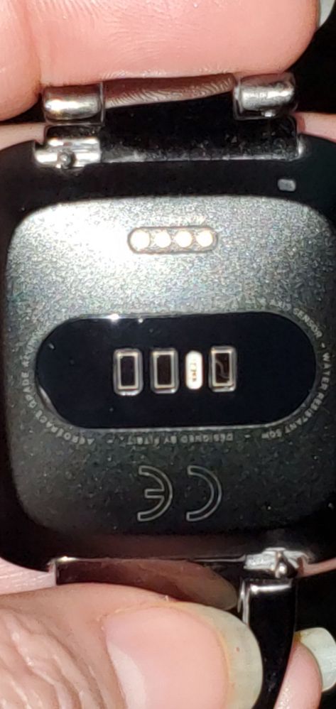 The one to the right of the white sensor has a line.  Is it a crack?