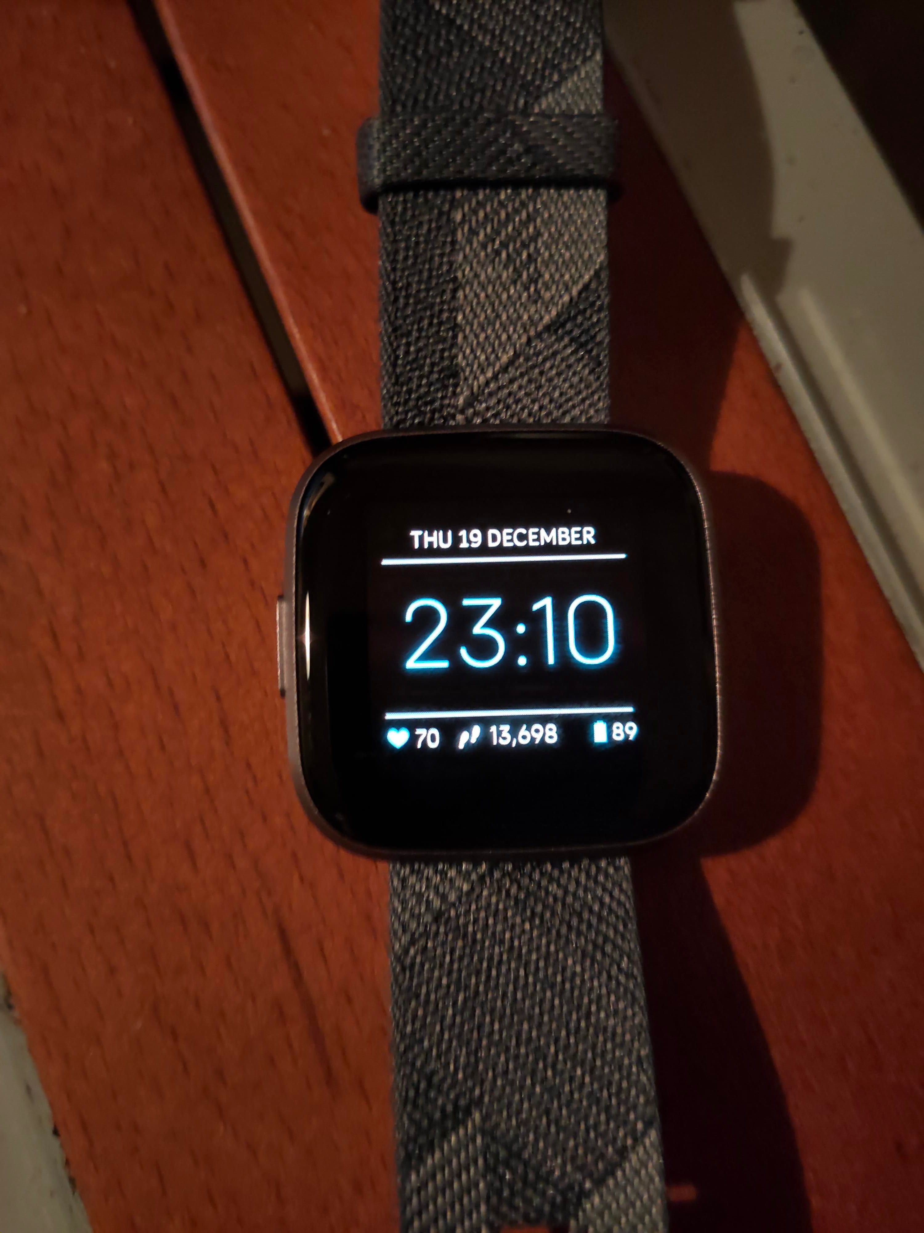 how to change fitbit clock face back to original