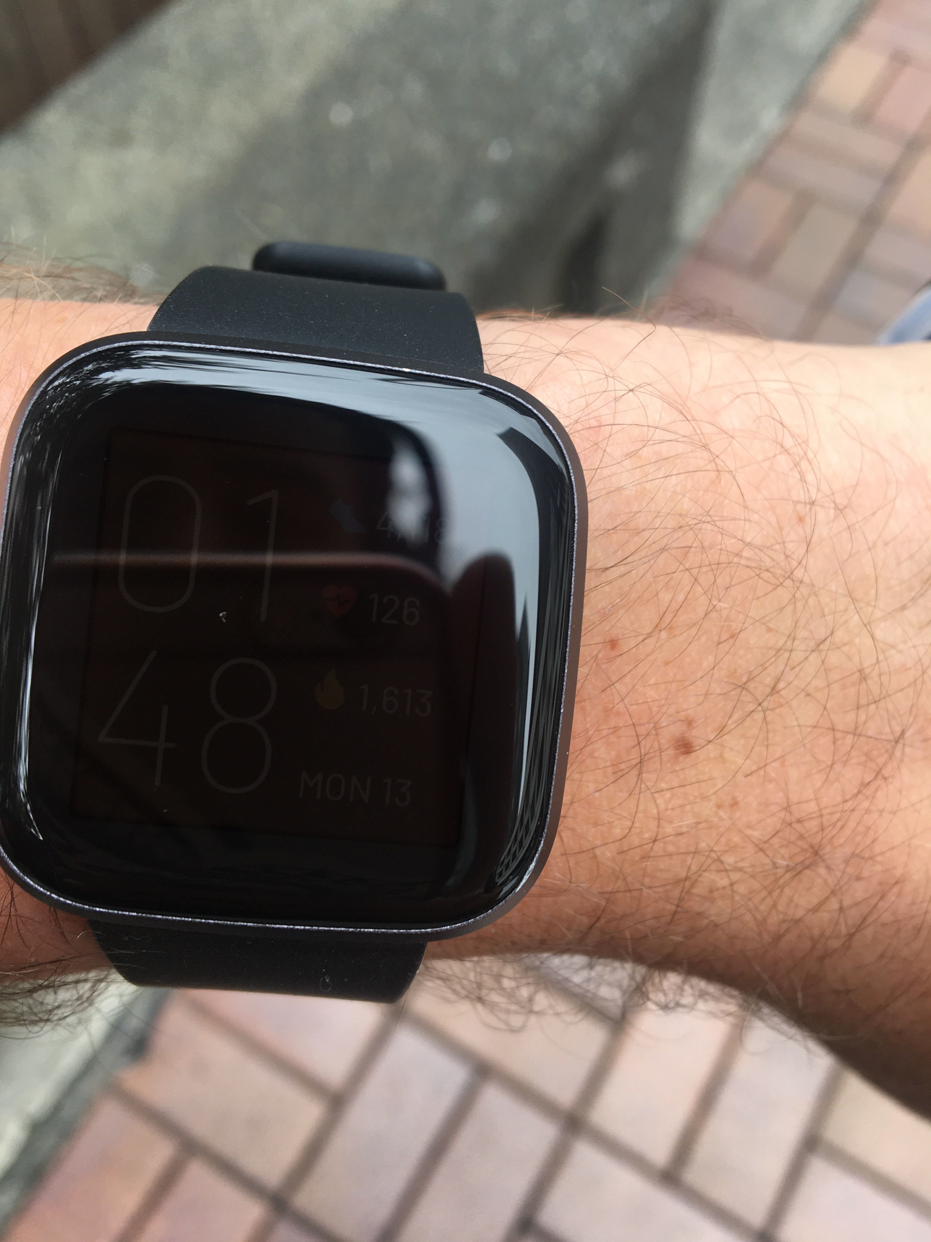 how to turn up brightness on fitbit versa