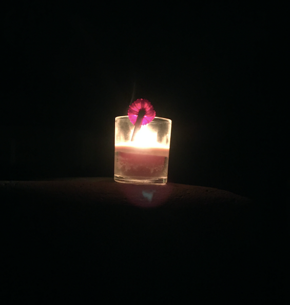 Candle with poppy flower.