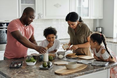 family-making-breakfast-in-the-kitchen-4259140.jpg