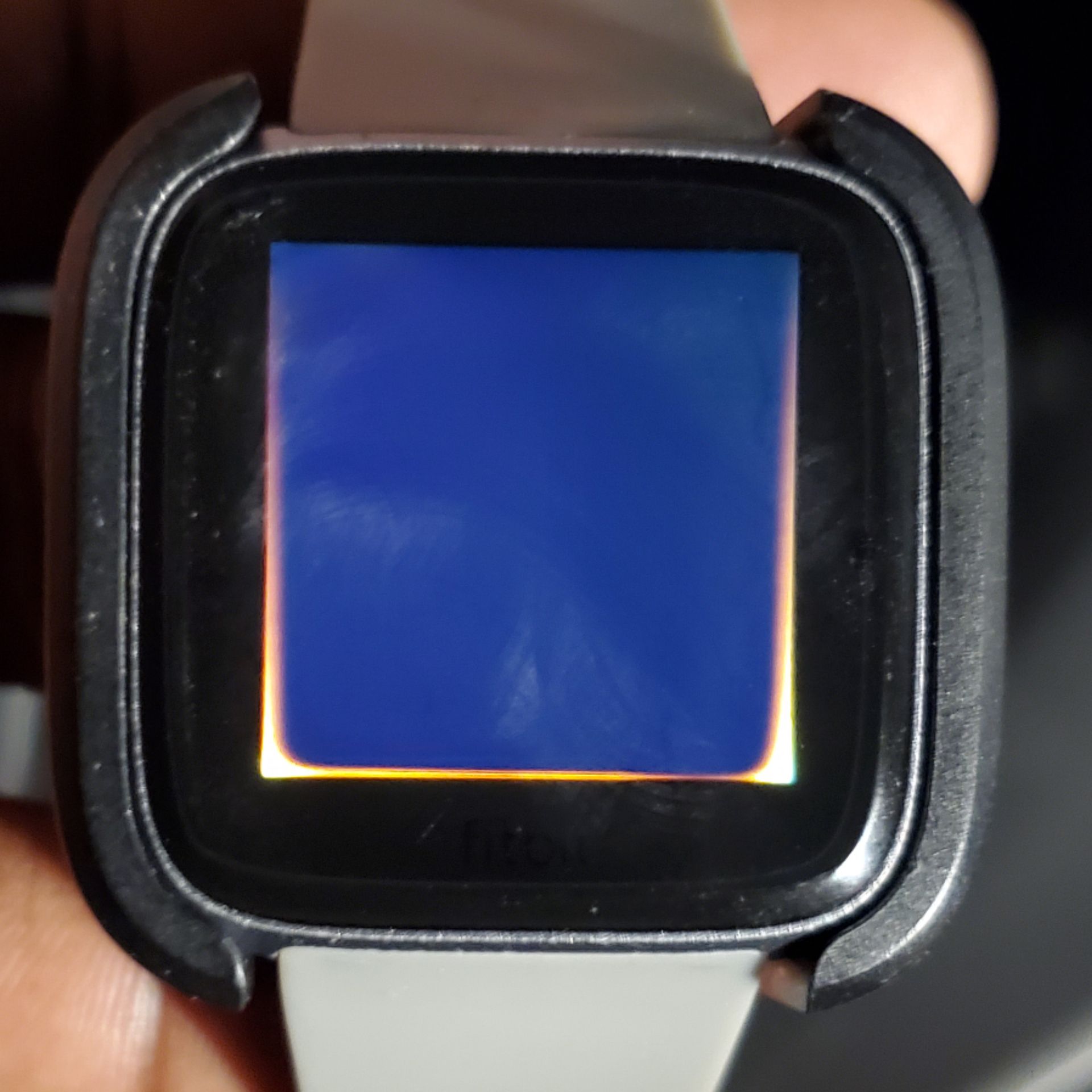 how to reset fitbit versa when screen is black