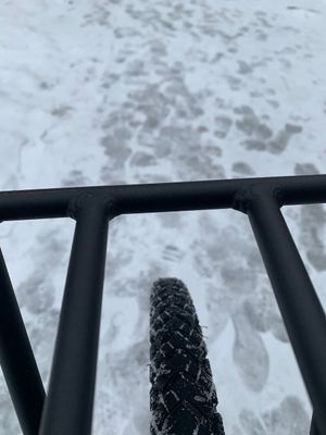 bike tire studs -- looking through the front rack