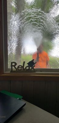 Cleaning the sunroom windows at the cottage
