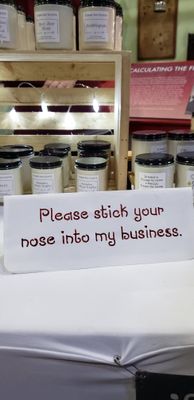 Was at a Craft Show, this sign was at a table that was selling homemade candles :)