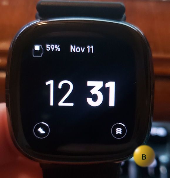 Changing clock face on fitbit online versa