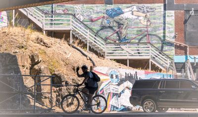 Stairs up top AND a werewolf on a bike.