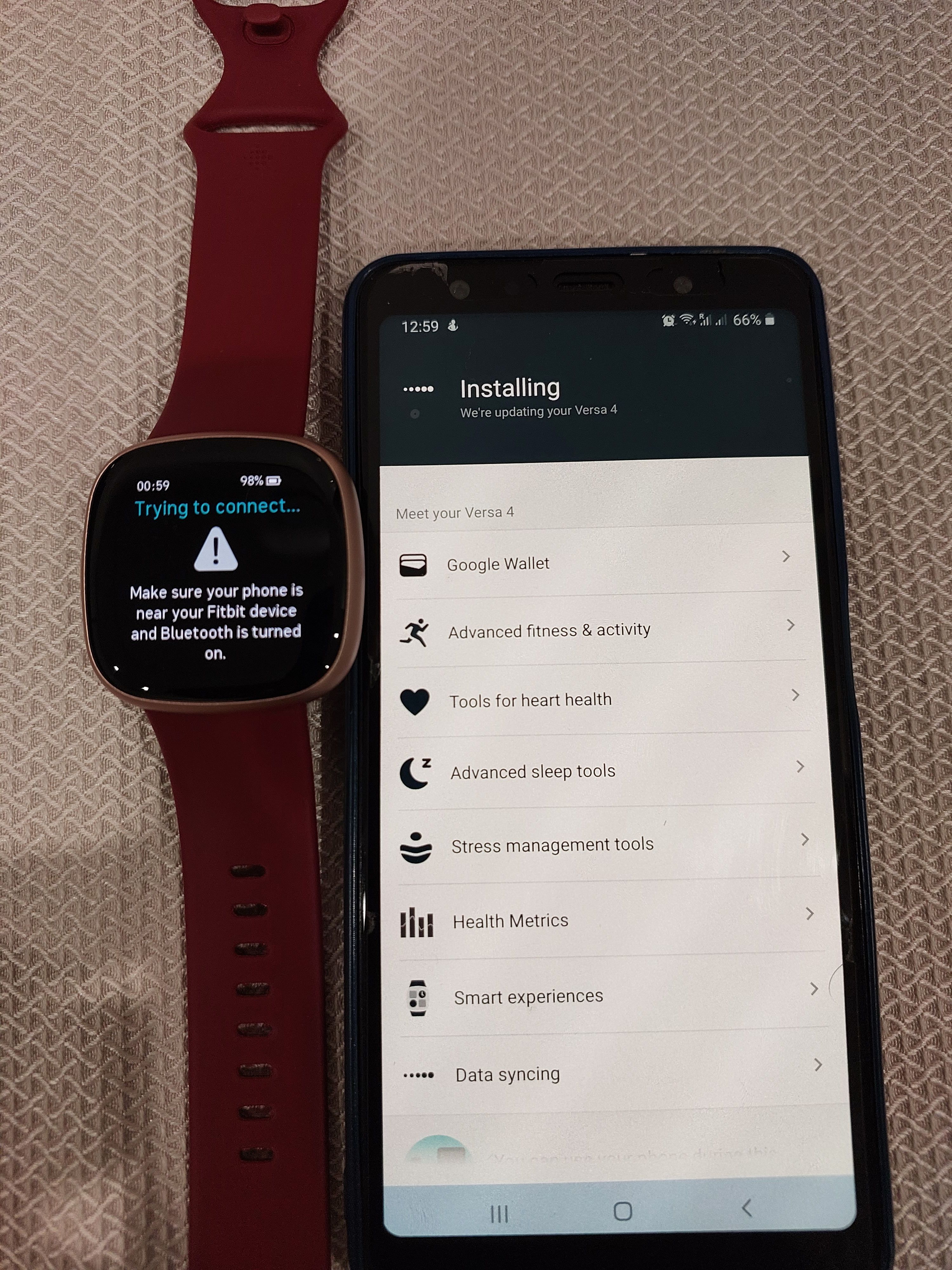 Connecting fitbit cheap versa to phone