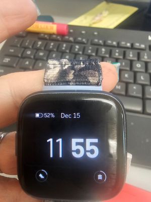 Clock face switches to black screen with time and Fitbit