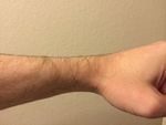 Left hand which Stainless Steel backed watch has been on other than for these photos for 3 years 24/7 including in the shower