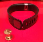 With binder fastener and hole punched-out on the band