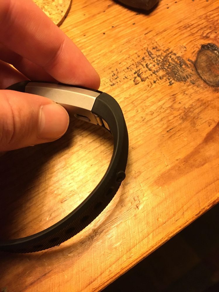 The rubber band inside the band pops out every time I take off my Fitbit. I am able to push it back in, but it's only a matter of time before the whole thing comes out and I lose it. How can I get this fixed?