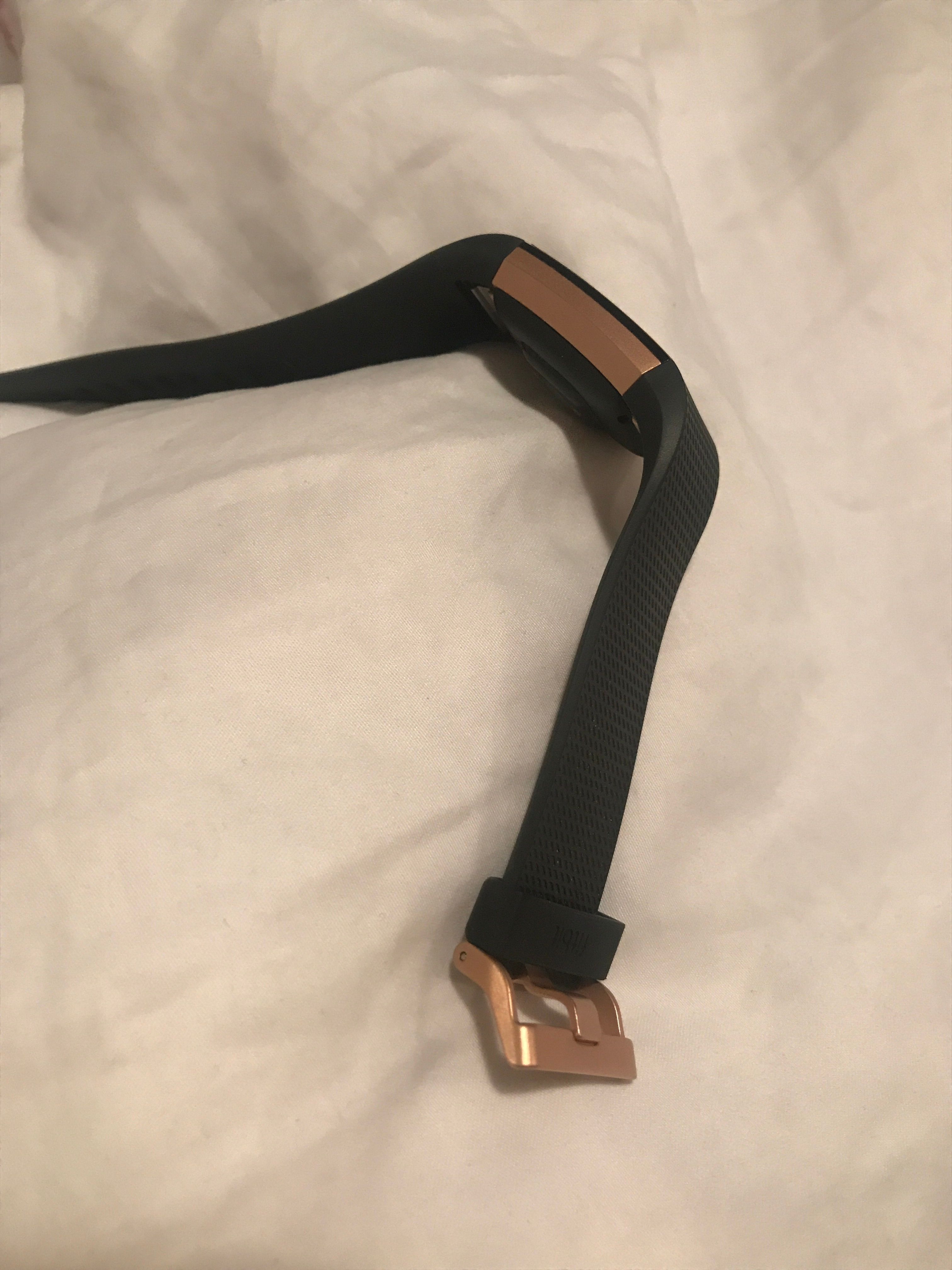 black and rose gold fitbit