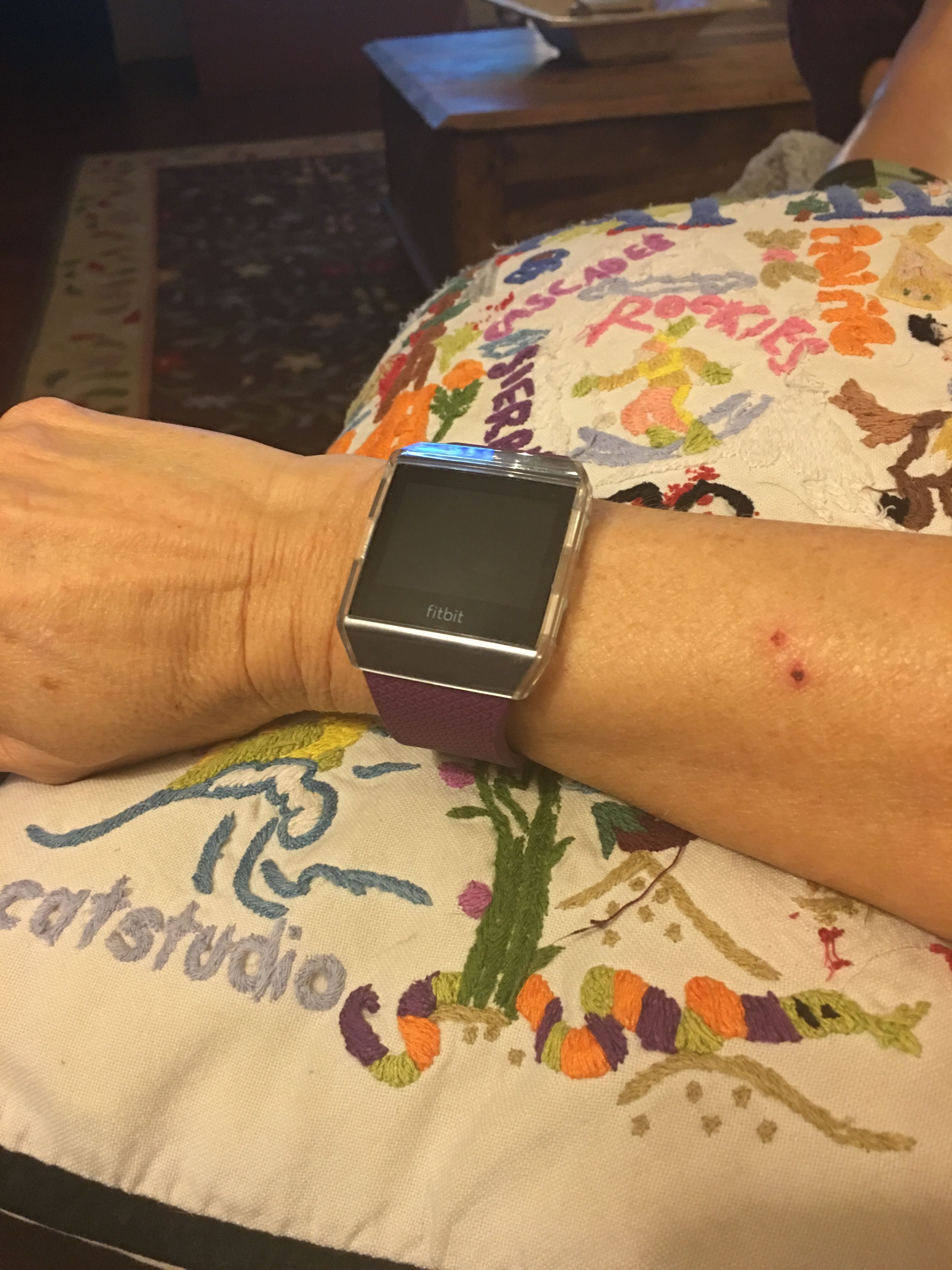 fitbit ionic on woman's wrist