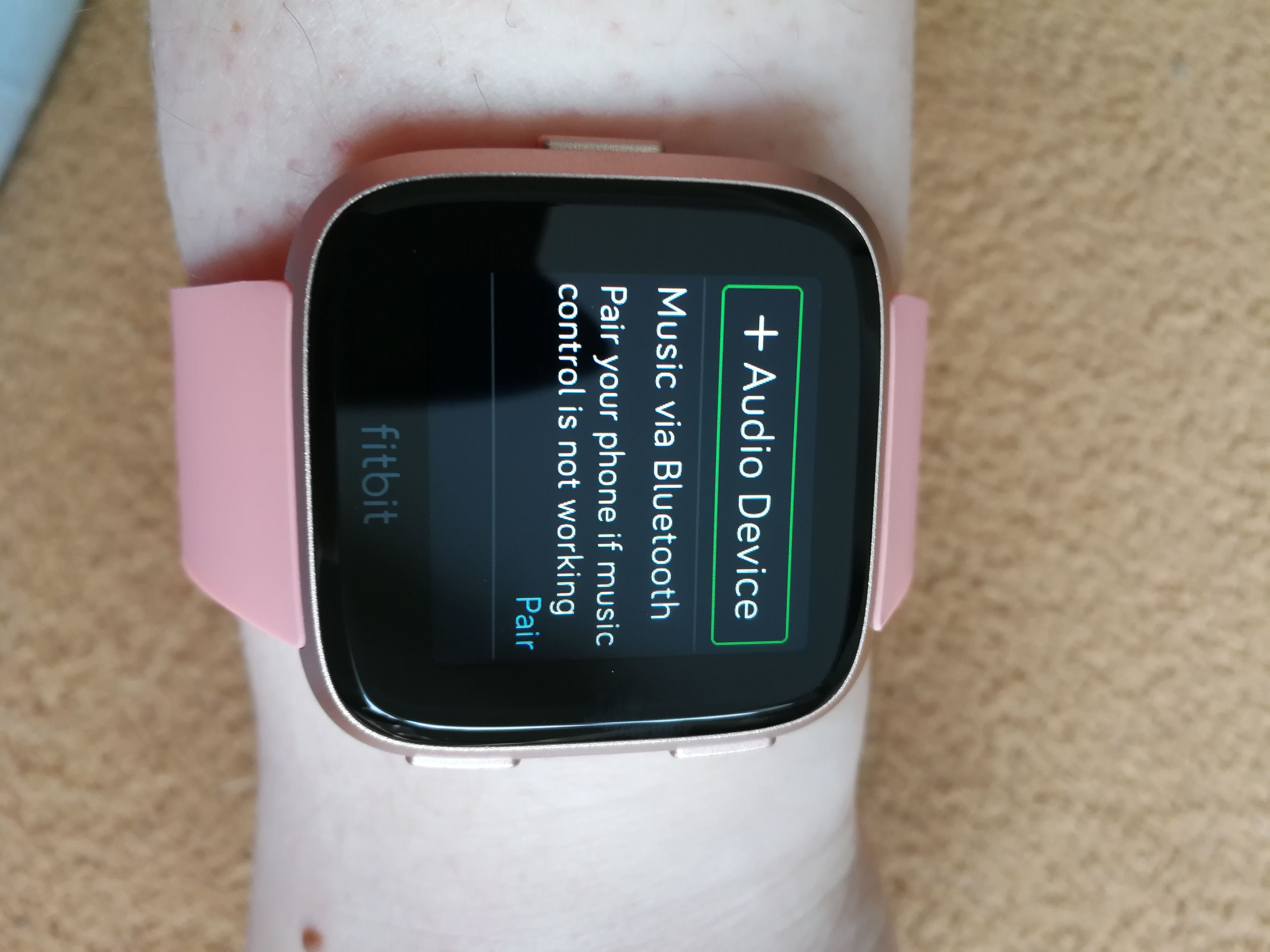 how to sync fitbit versa with phone