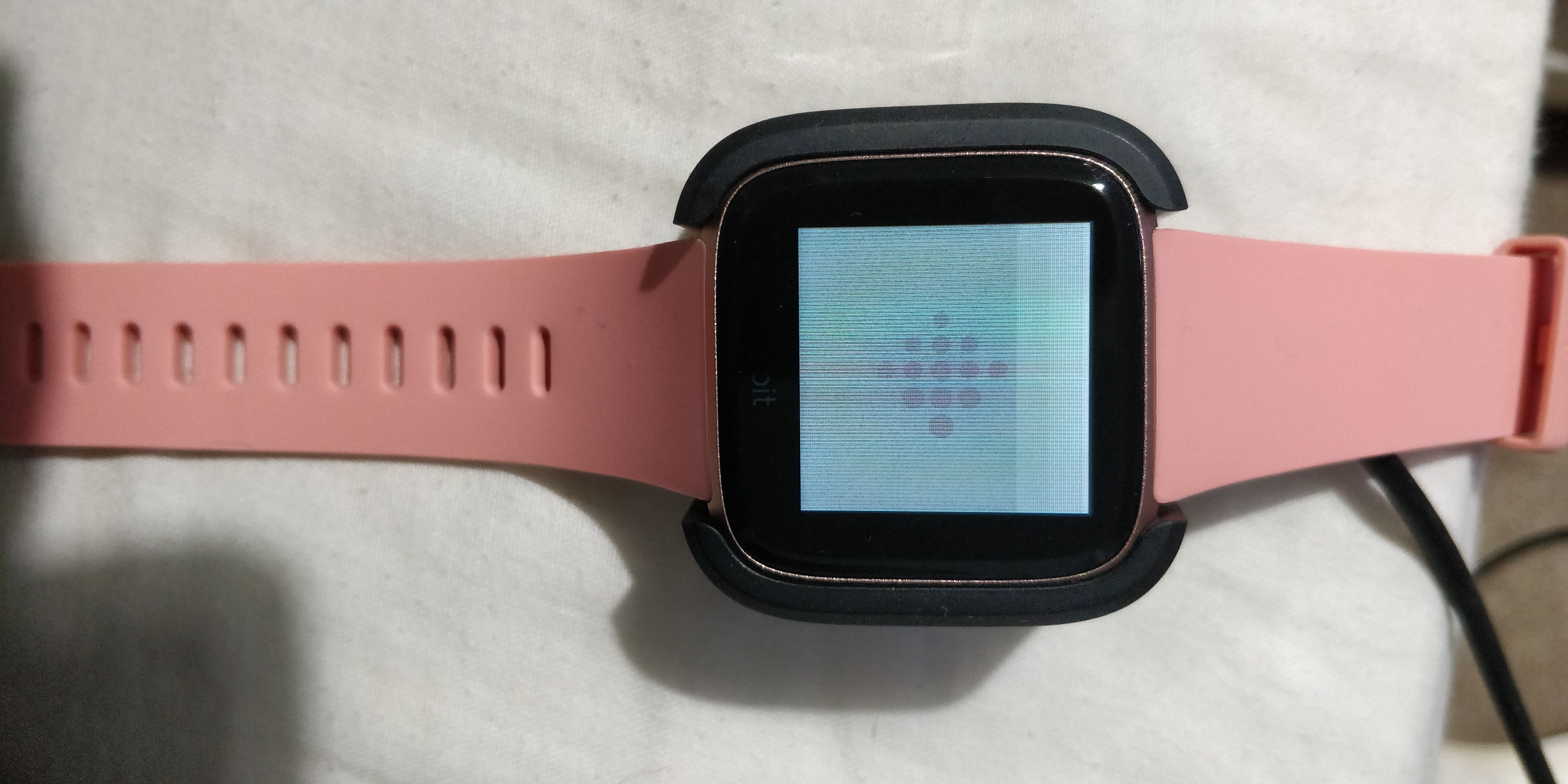 how to change the screen on fitbit versa