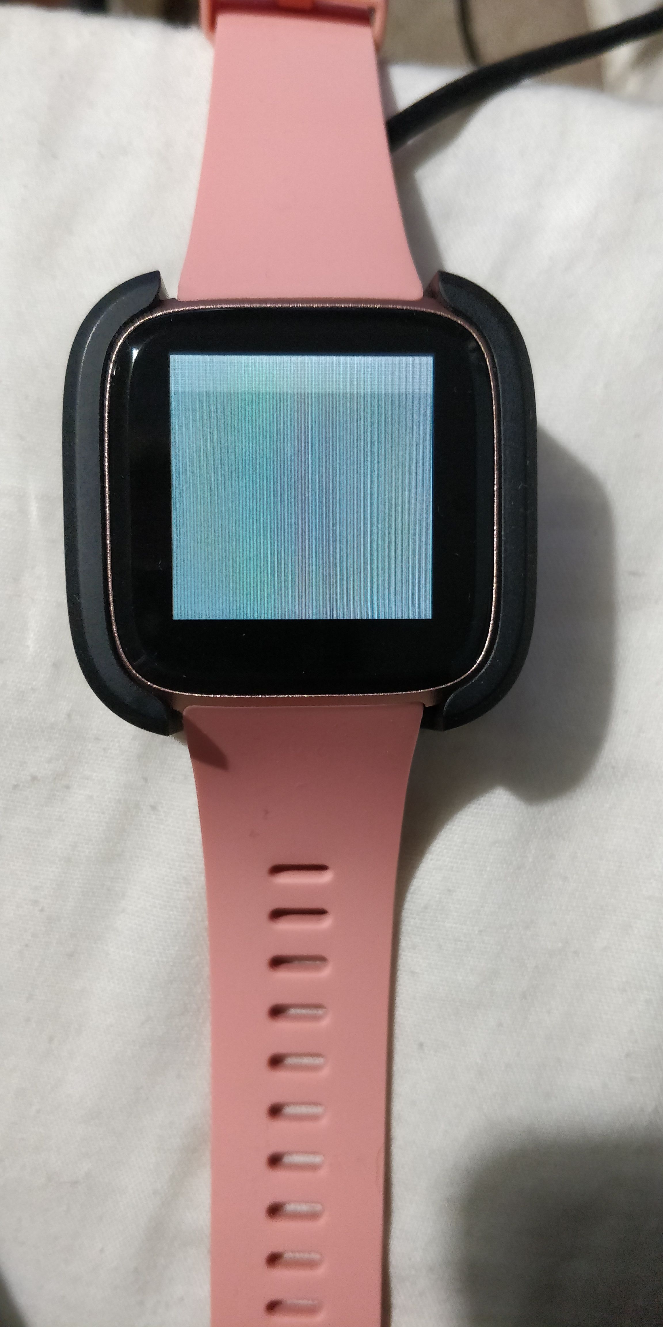 how to change screen on fitbit versa 2