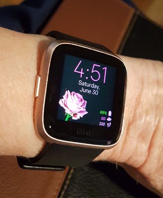 fitbit versa rose gold with black band