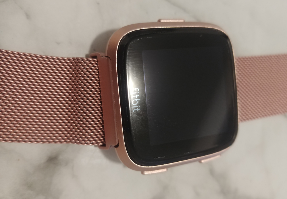 Fitbit versa rose gold with silver band online