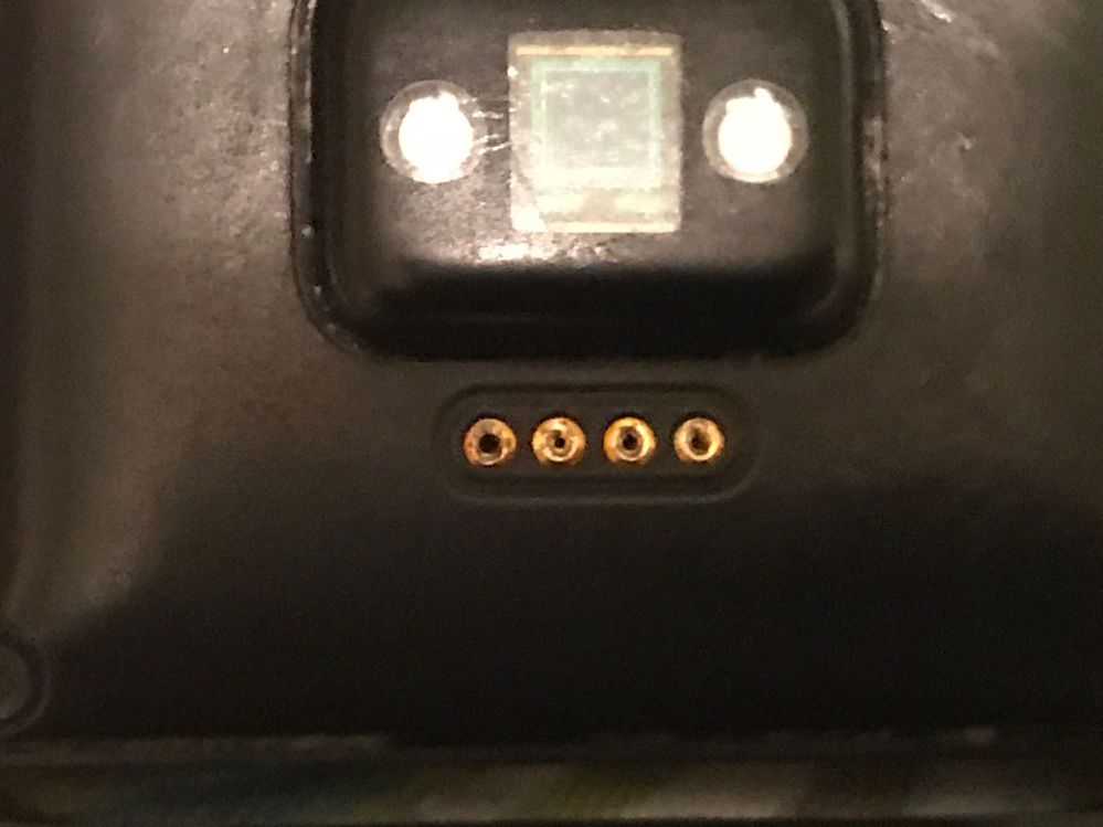 These holes are from the charging caddy