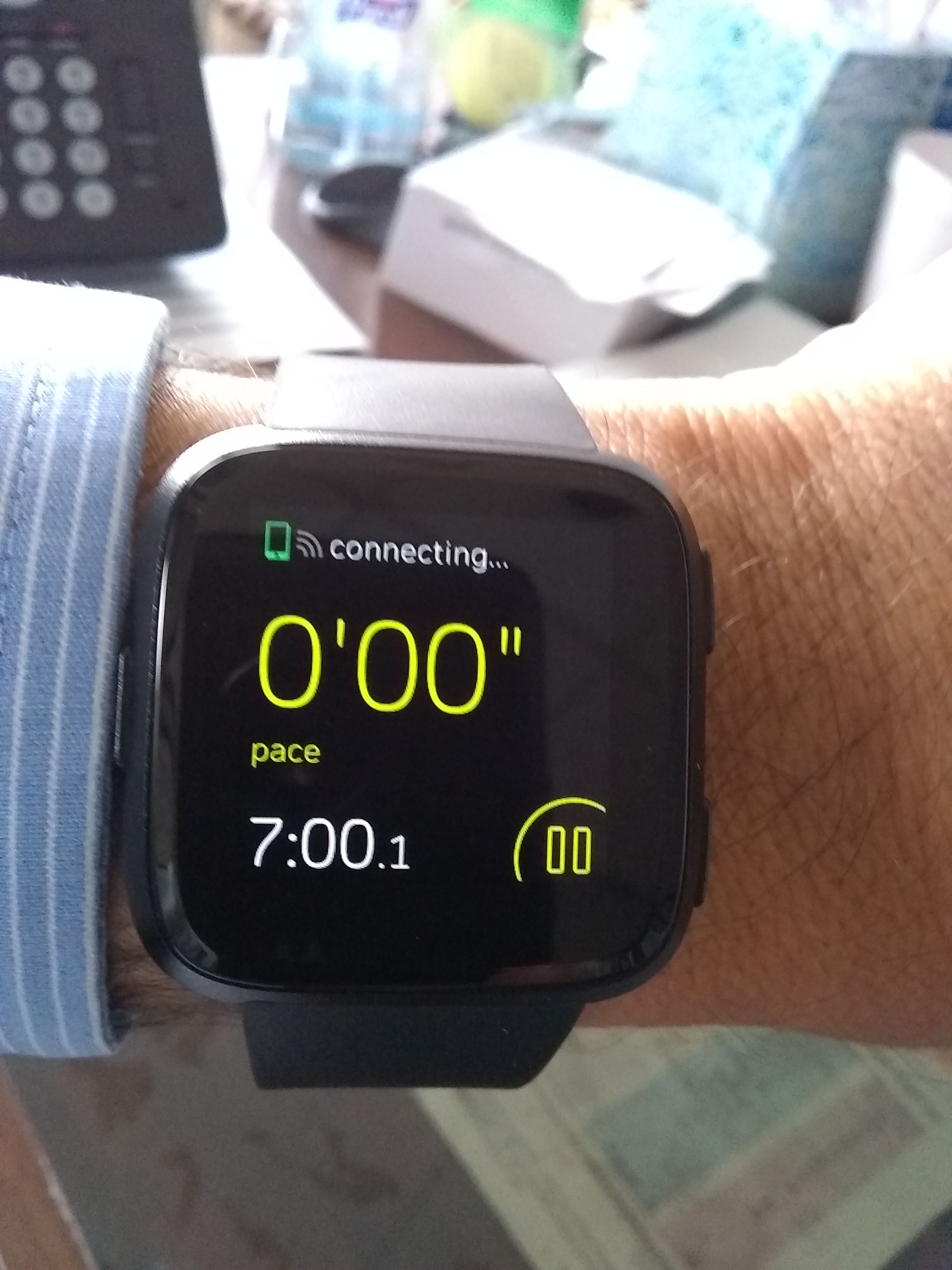 how to sync fitbit versa with strava