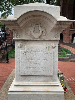 Poe was relocated to an area right at the entry of the burial ground.  His wife rests there with him