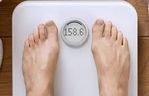 stepping on scale.jpg