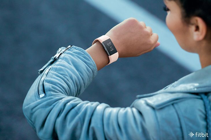 Fitbit charge 4 on woman's wrist sale