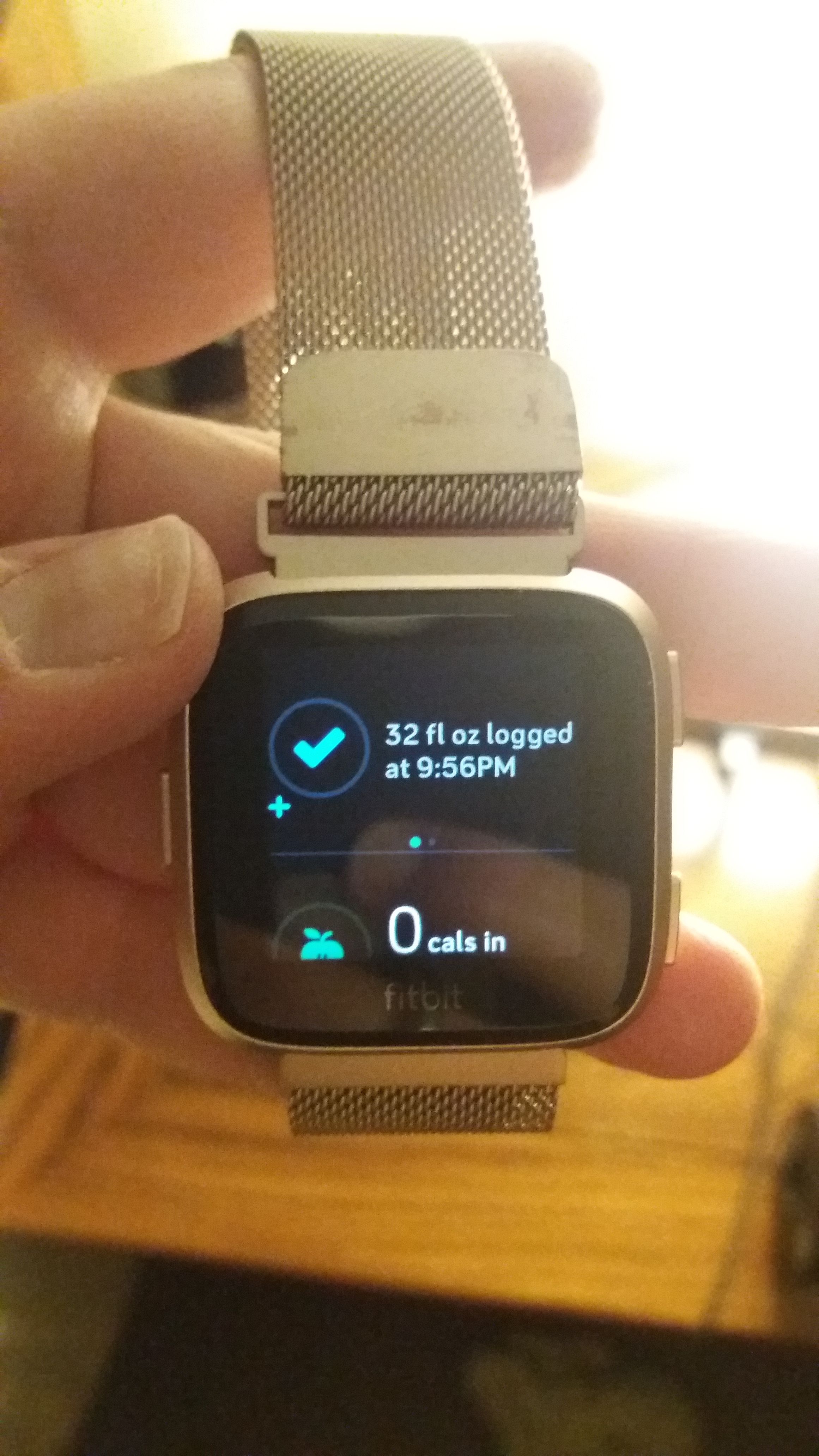 resetting versa fitbit