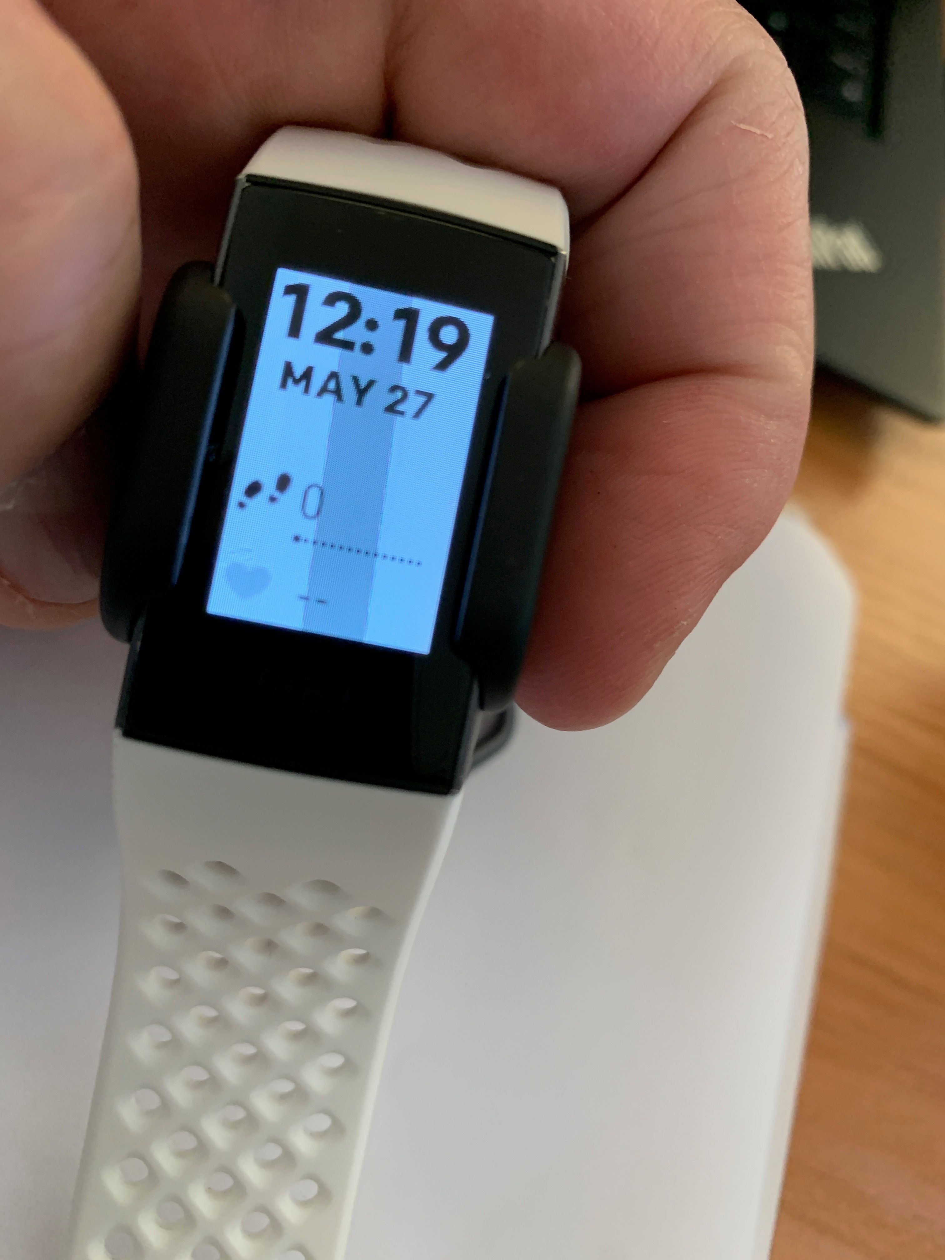 fitbit charge 3 white vertical lines on screen