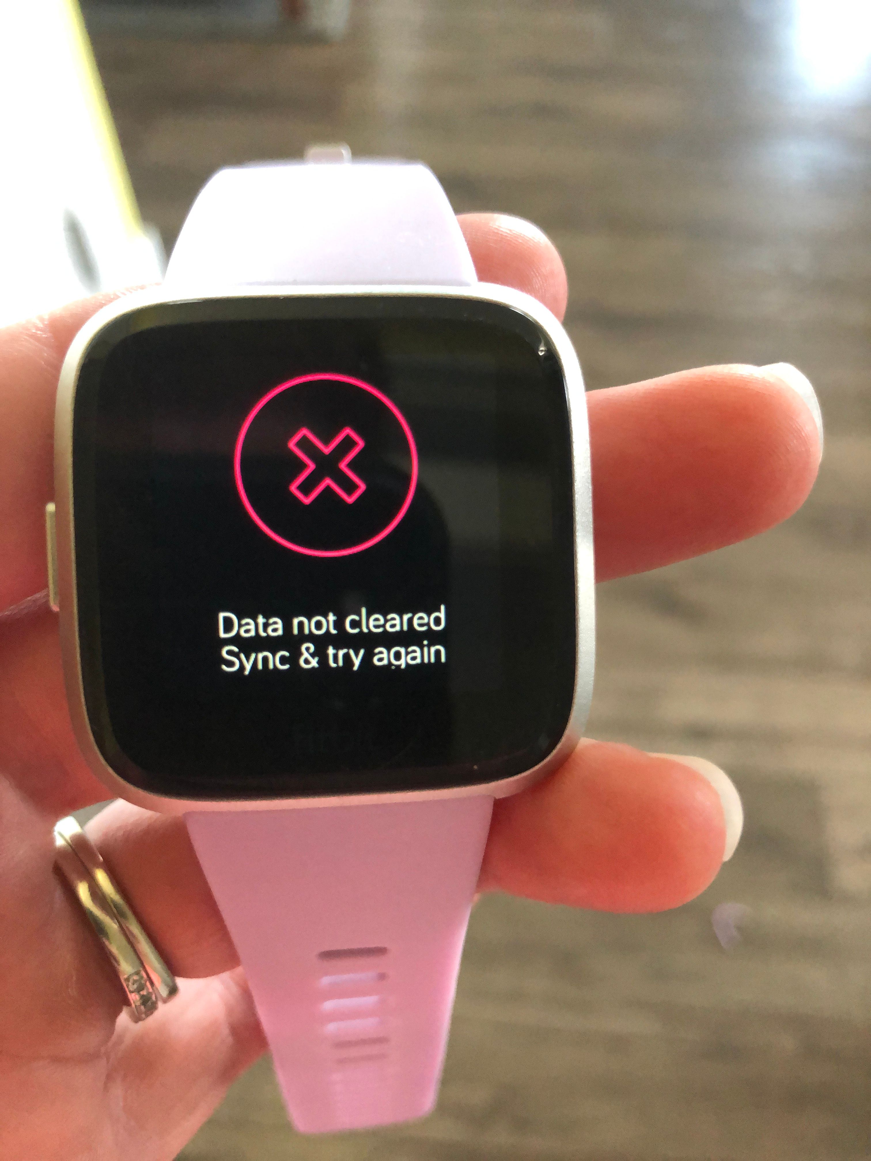 Solved: Red X on screen - Fitbit Community