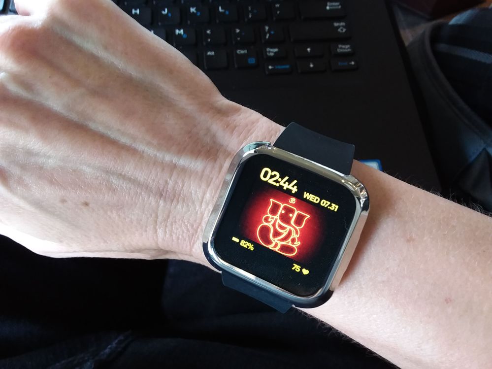 Customizable watch face with Ganesha Om pic
