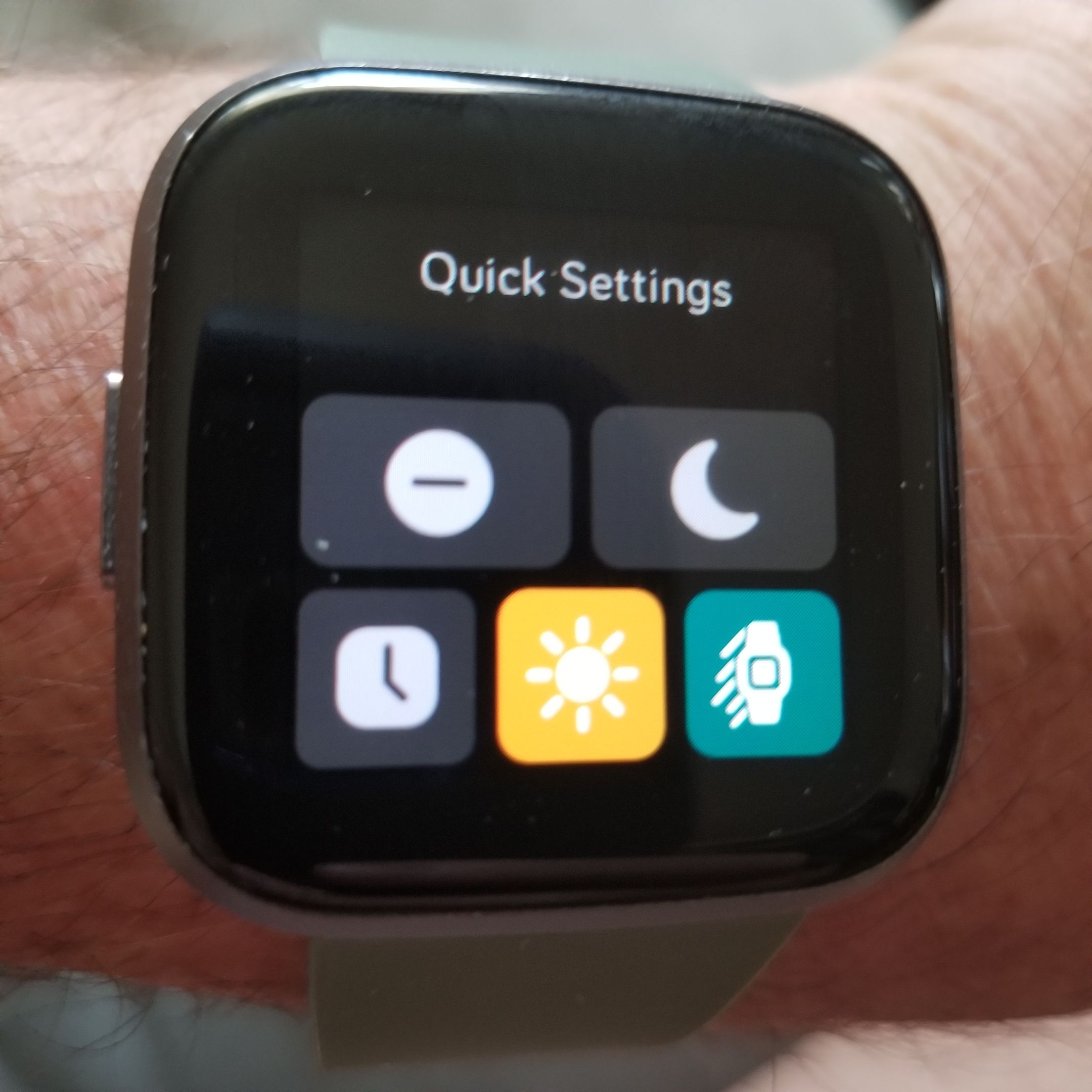 how to change quick settings on fitbit versa