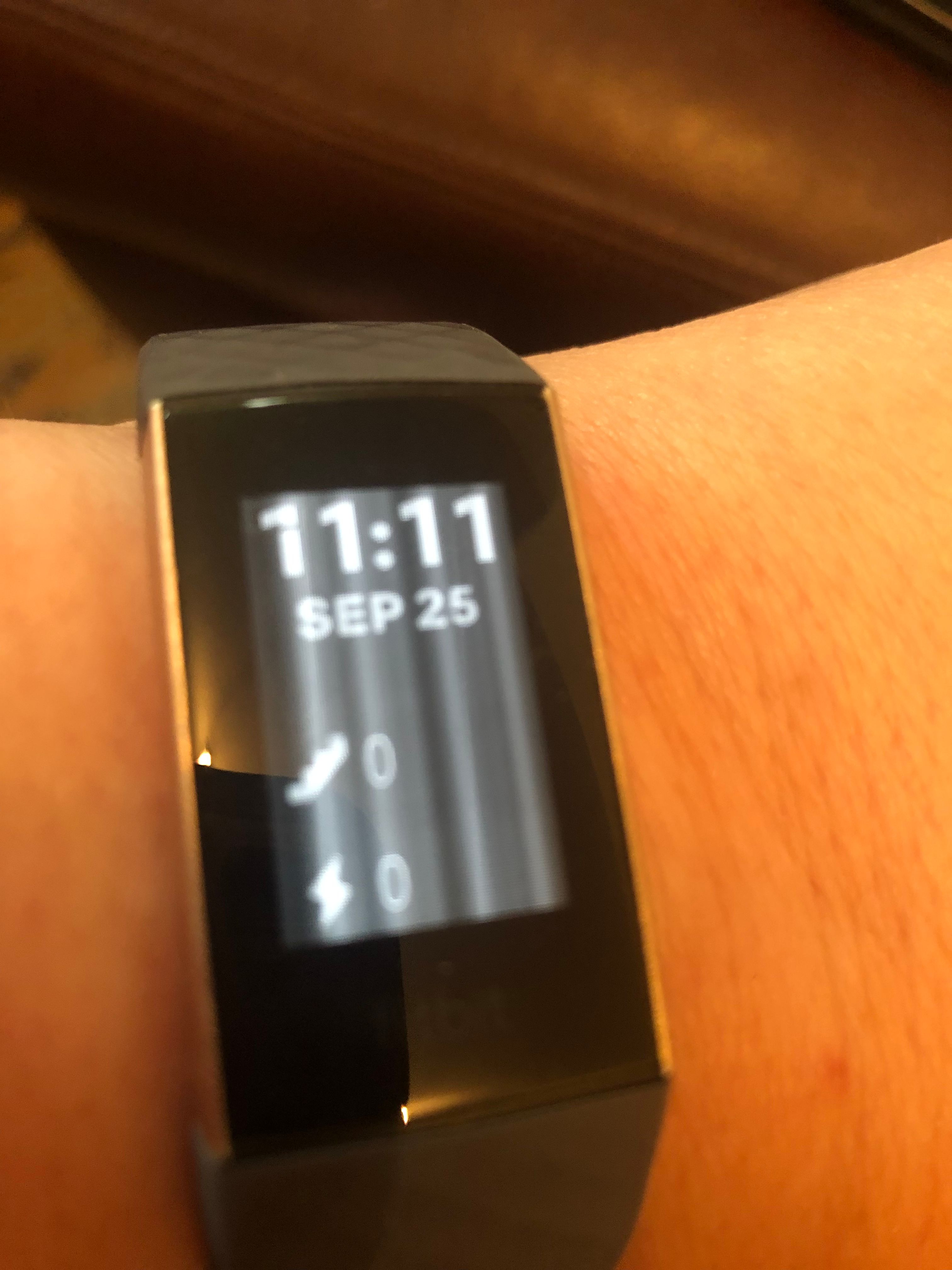 fitbit charge 3 white vertical lines on screen